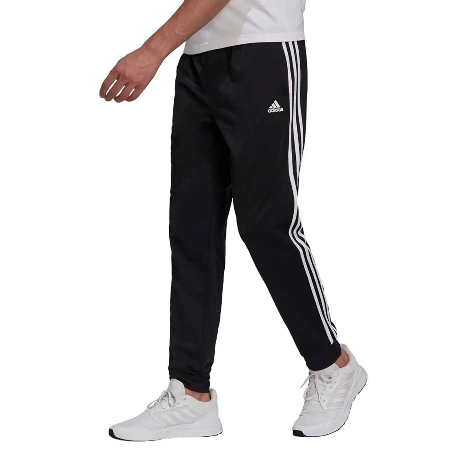 adidas Essentials Warm-Up Tapered 3-Stripes Track Pants